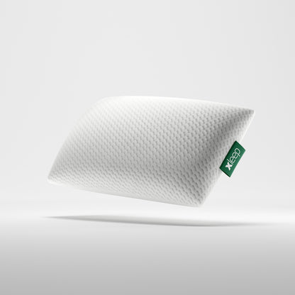 Orthopädisches Xleep CoolXleep Kopfkissen mit strukturiertem weißen Bezug und grünem Marken-Logo.
