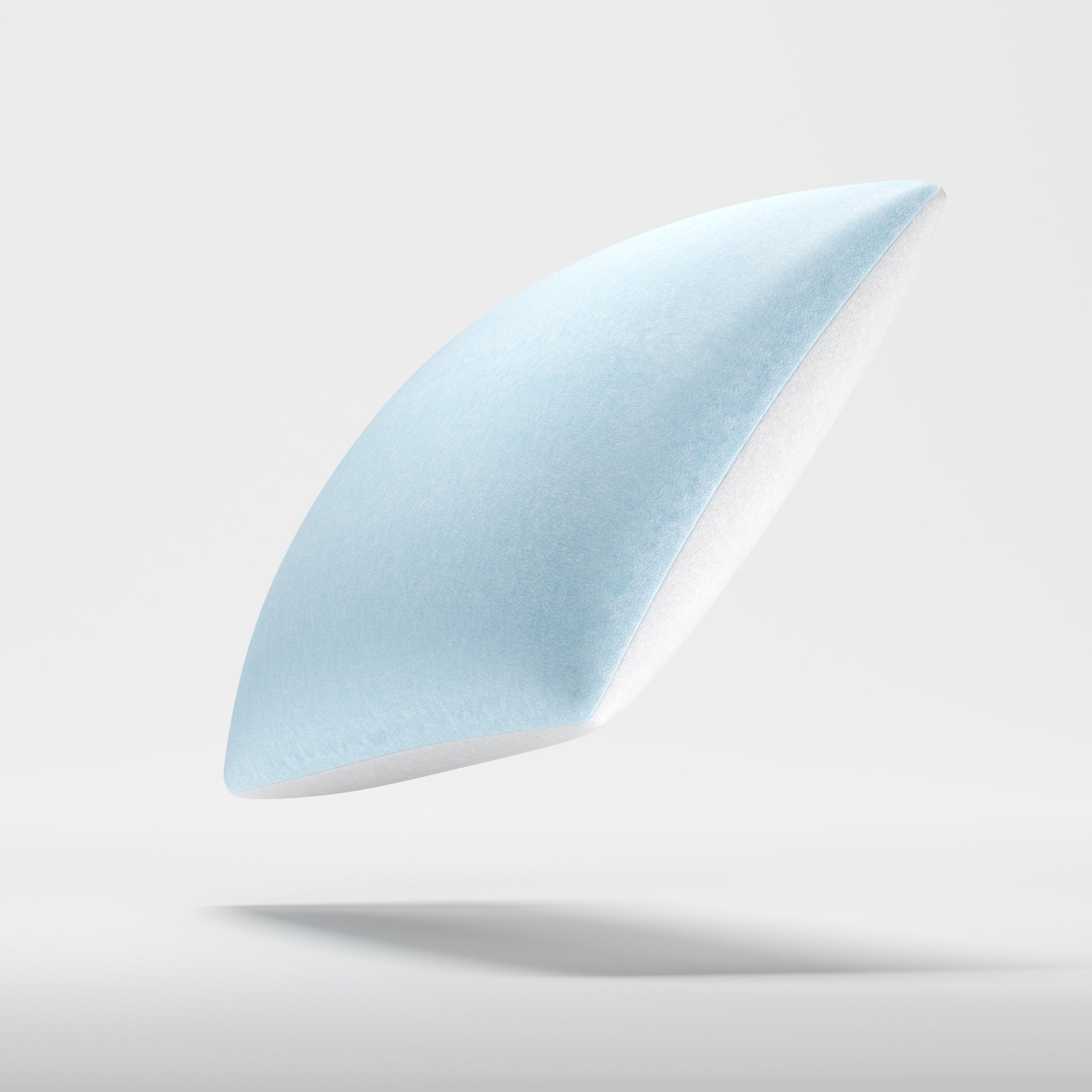 Profilansicht des ergonomischen blauen Kissenkerns des Xleep CoolXleep ohne Außenhülle.